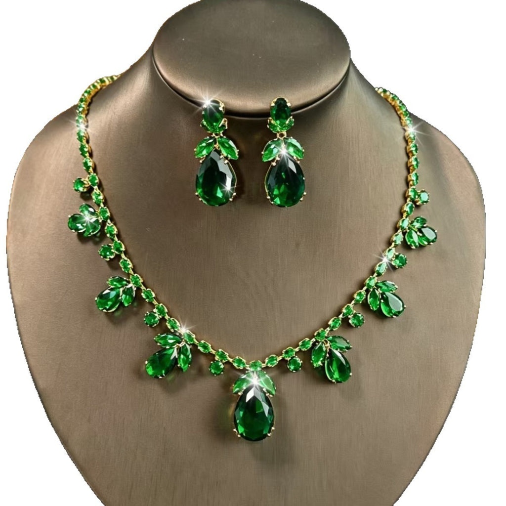 Pink Cubic Zirconia Leaf Jewelry Set, Gold-Plated Teardrop Necklace and Drop Earrings — shown in use