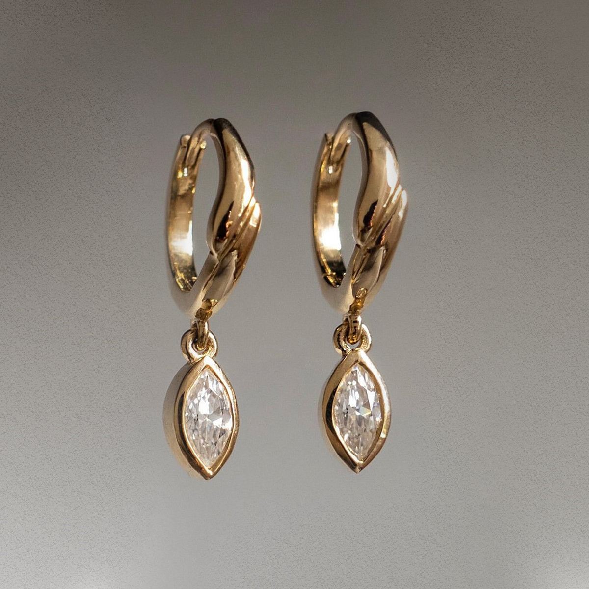 Sterling Silver Twist Huggie Drop Earrings With Marquise-Cut Moissanite, D-VVS1 — alternate angle