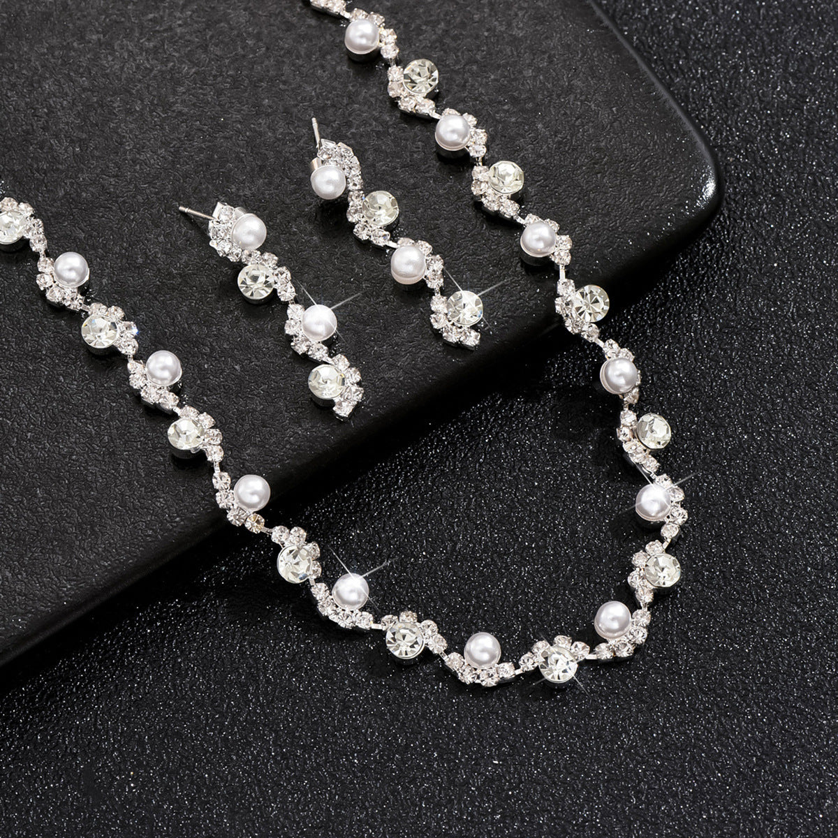 Rhinestone and Zircon Teardrop Necklace and Earrings Bridal Set in Four Styles — front view