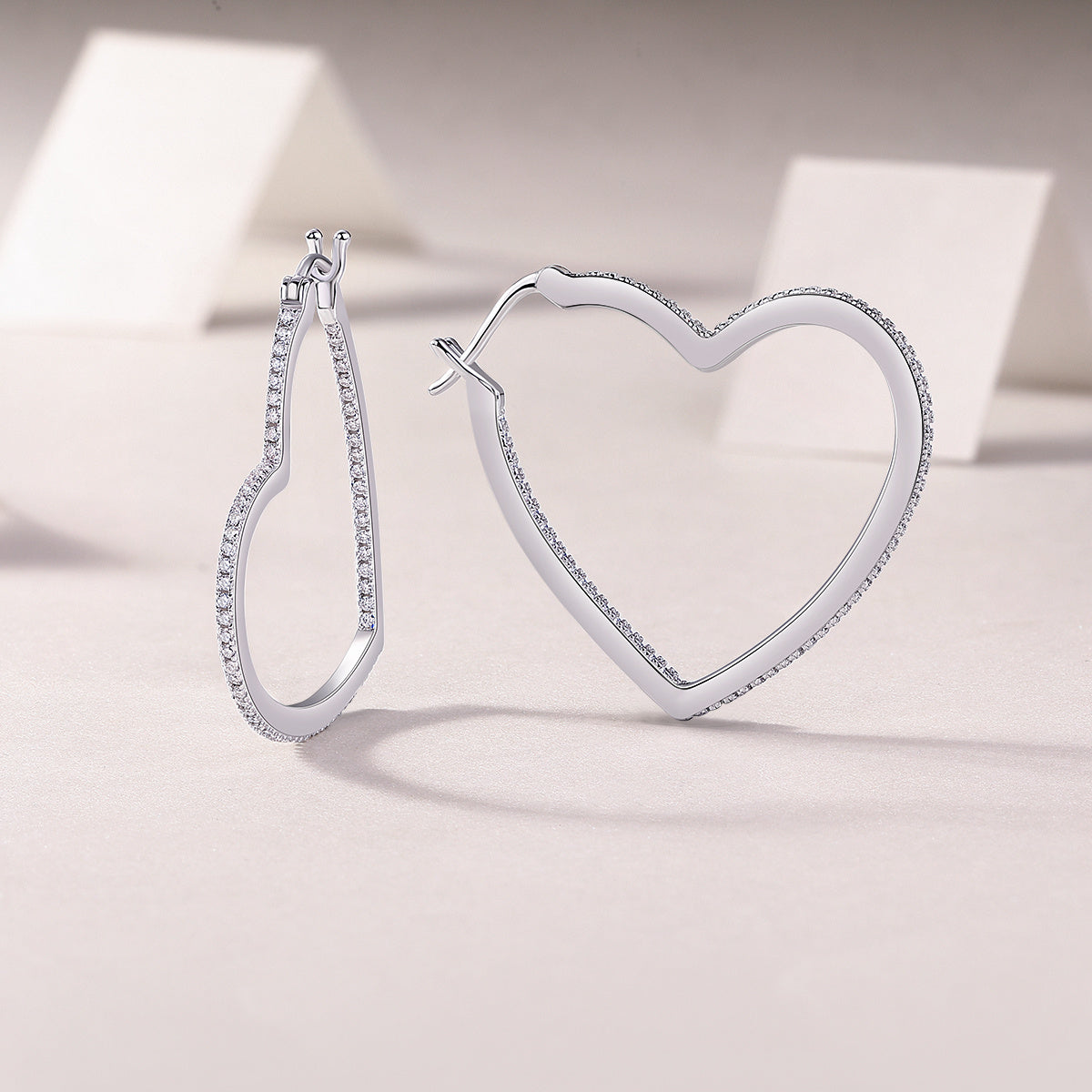 Sterling Silver Open Heart Hoop Earrings With 44 Pave Moissanite Stones, D-VVS1 — side view