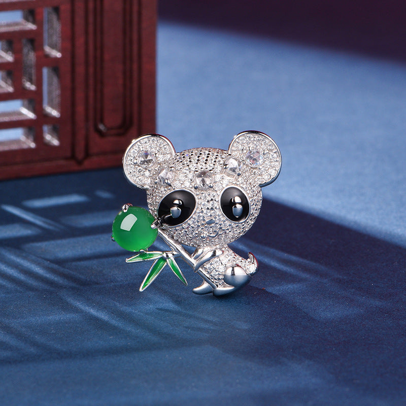 Sterling Silver Panda Brooch With 8 x 6 mm Oval Green Chalcedony and Pave Stones — detail close-up