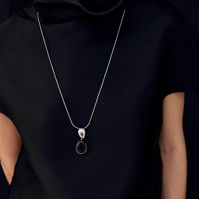 Black Onyx Necklace or Earrings in Gold or Silver Tone, Irregular Stitched Design — side view