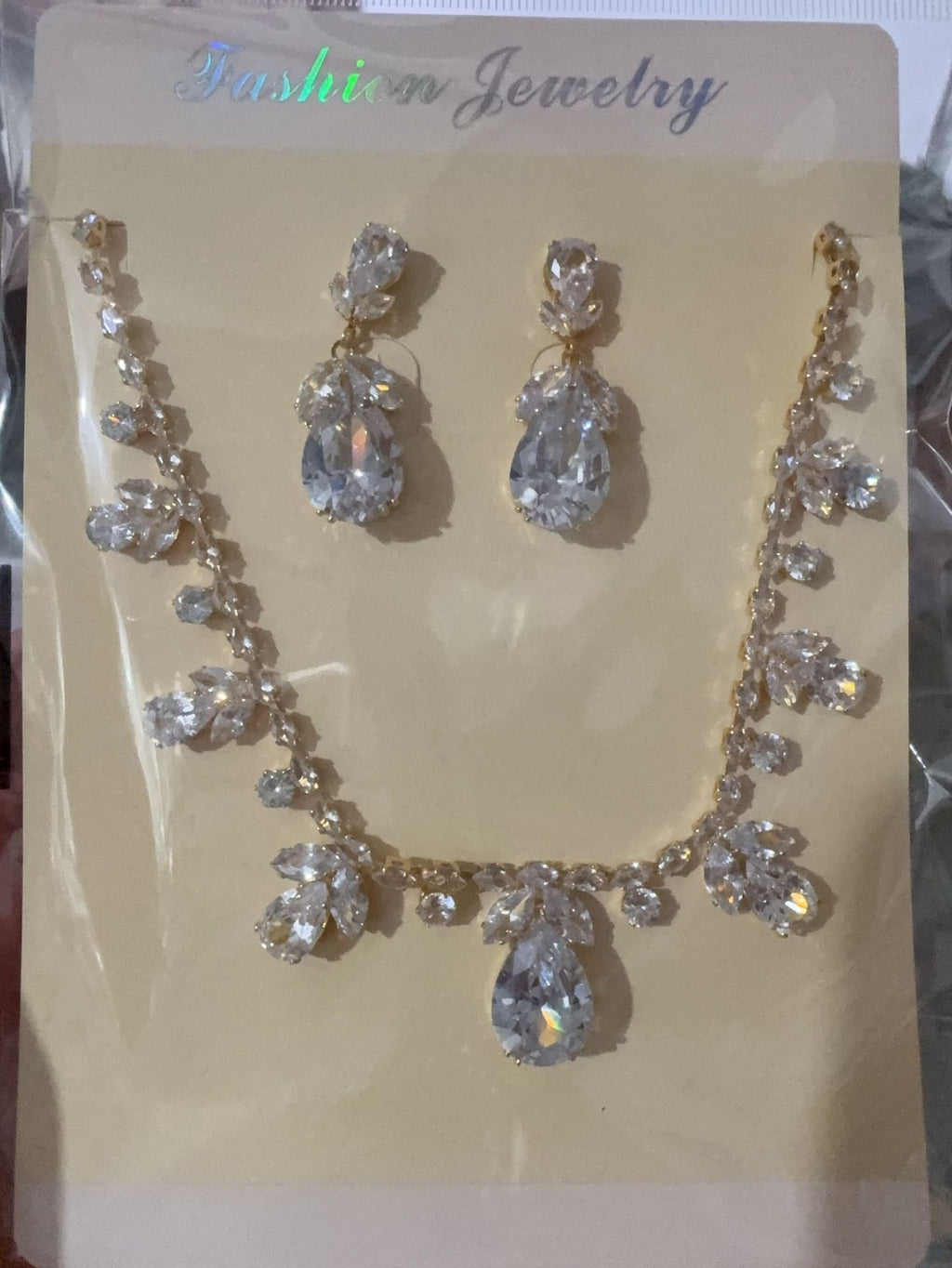 Pink Cubic Zirconia Leaf Jewelry Set, Gold-Plated Teardrop Necklace and Drop Earrings — finish detail
