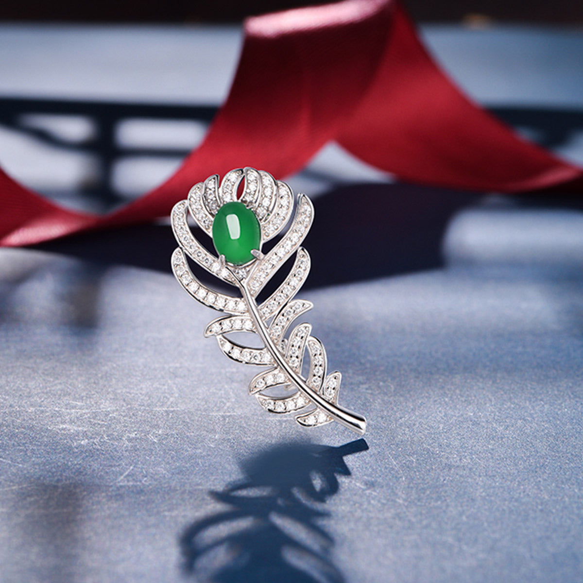 Sterling Silver Feather Brooch With 8 x 6 mm Green Chrysoprase Cabochon, Platinum-Plated — side view