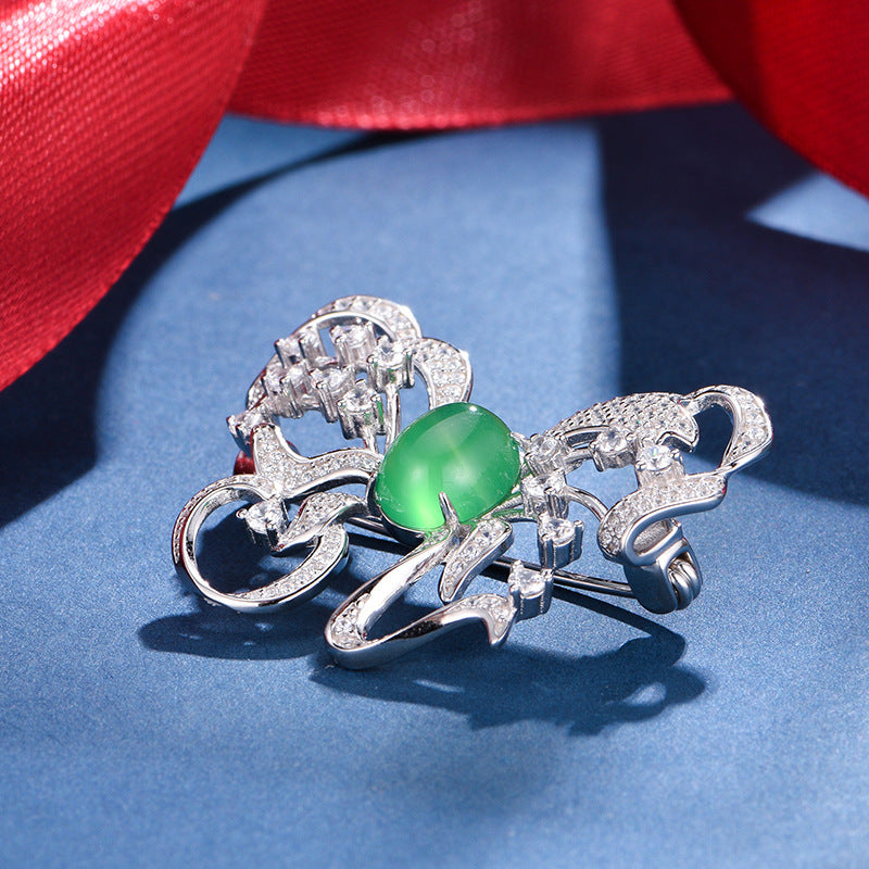 Sterling Silver Butterfly Brooch With 8 x 10 mm Green Chrysoprase Cabochon, Platinum-Plated — side view