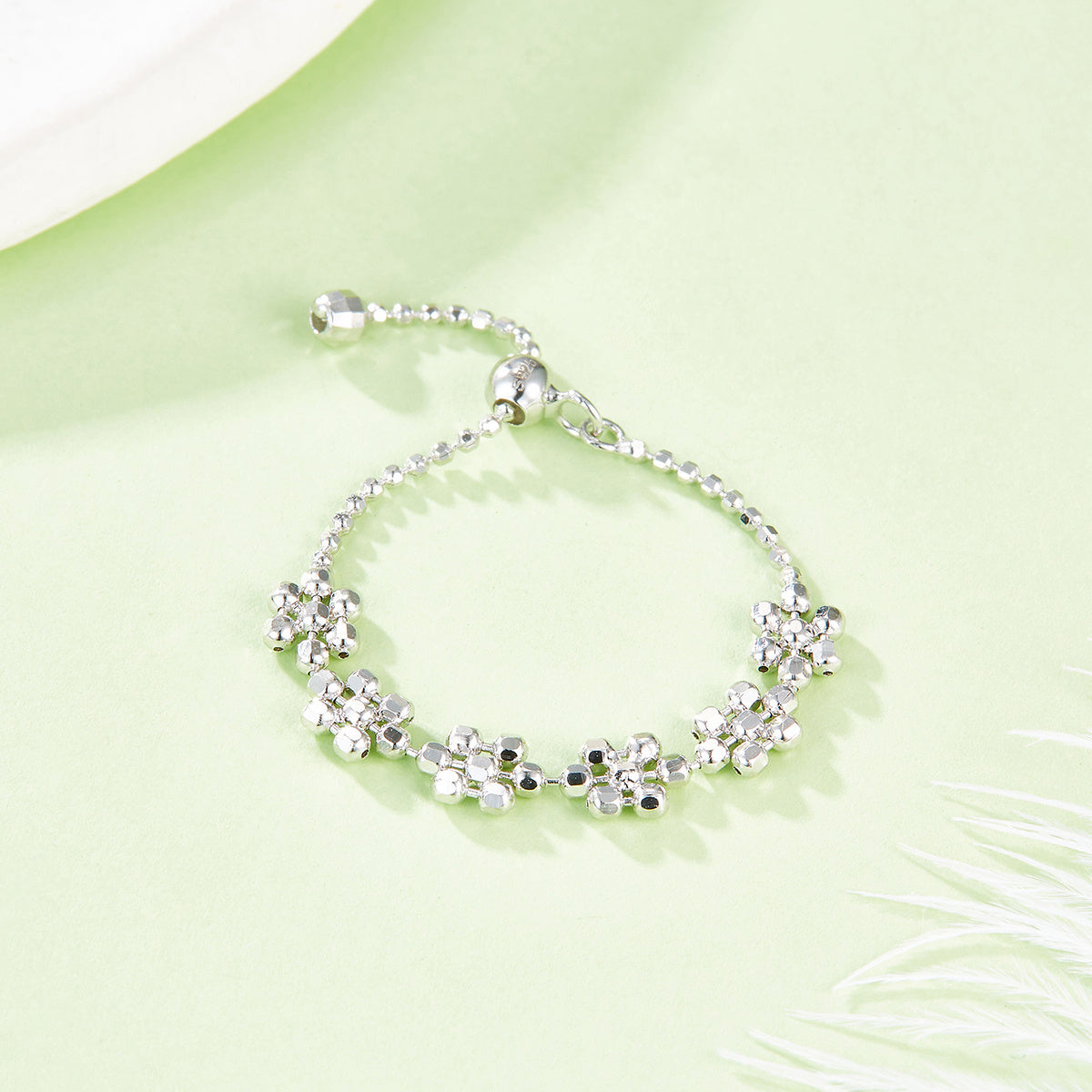 Sterling Silver Clover Flower Ring for Women, Adjustable 14 — shown in use