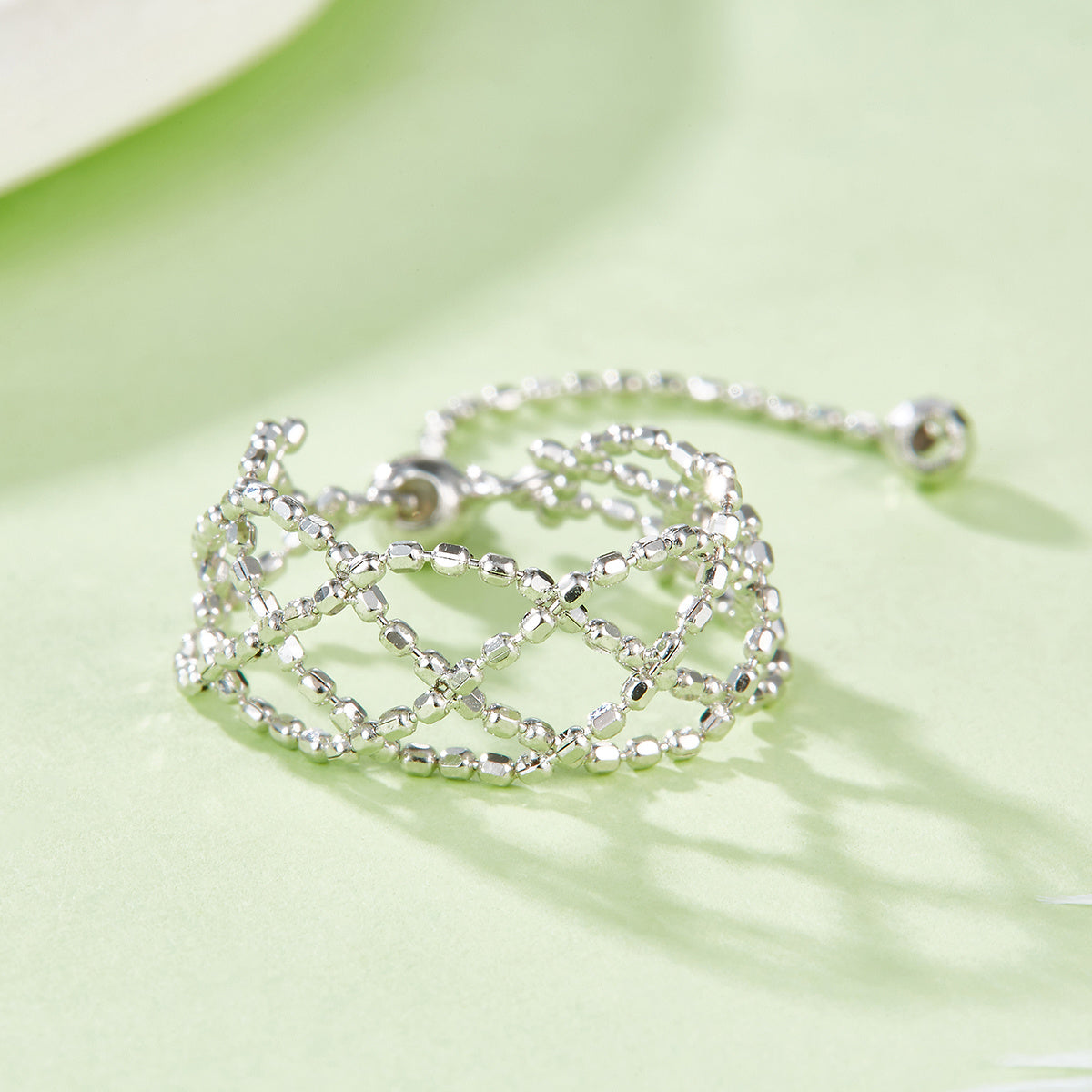 Sterling Silver Mesh Cutout Ring, 8.4 mm Wide — shown in use