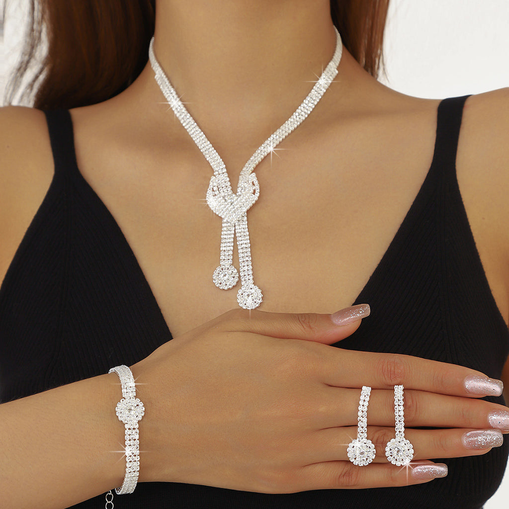 Crystal-Set Bridal Necklace and Earrings Set in Three Styles — front view
