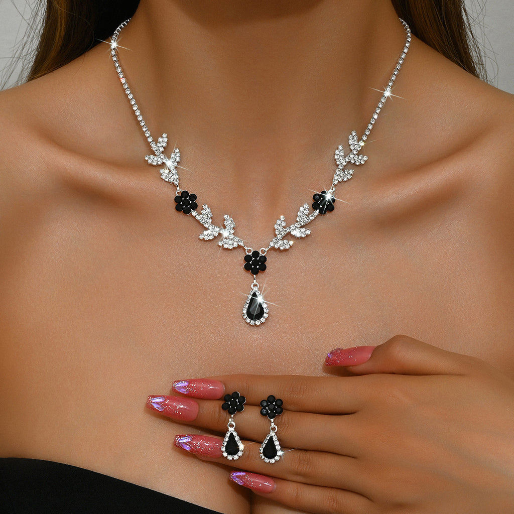 Teardrop and Flower Necklace and Earrings Set — side view