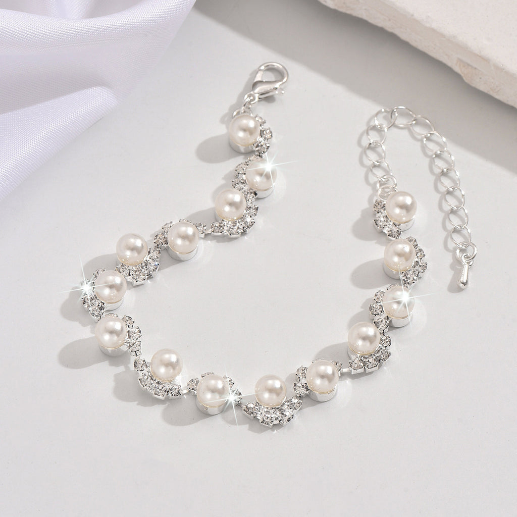 Pearl and Rhinestone Bracelet for Women, Silver Gold or Rose Gold-Tone — shown in use