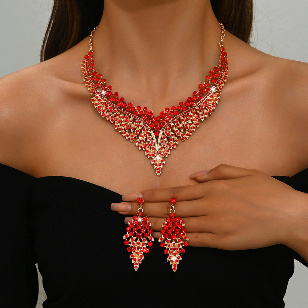 Stone-Set Flower Necklace and Earrings Bridal Set in Green, Red — detail close-up