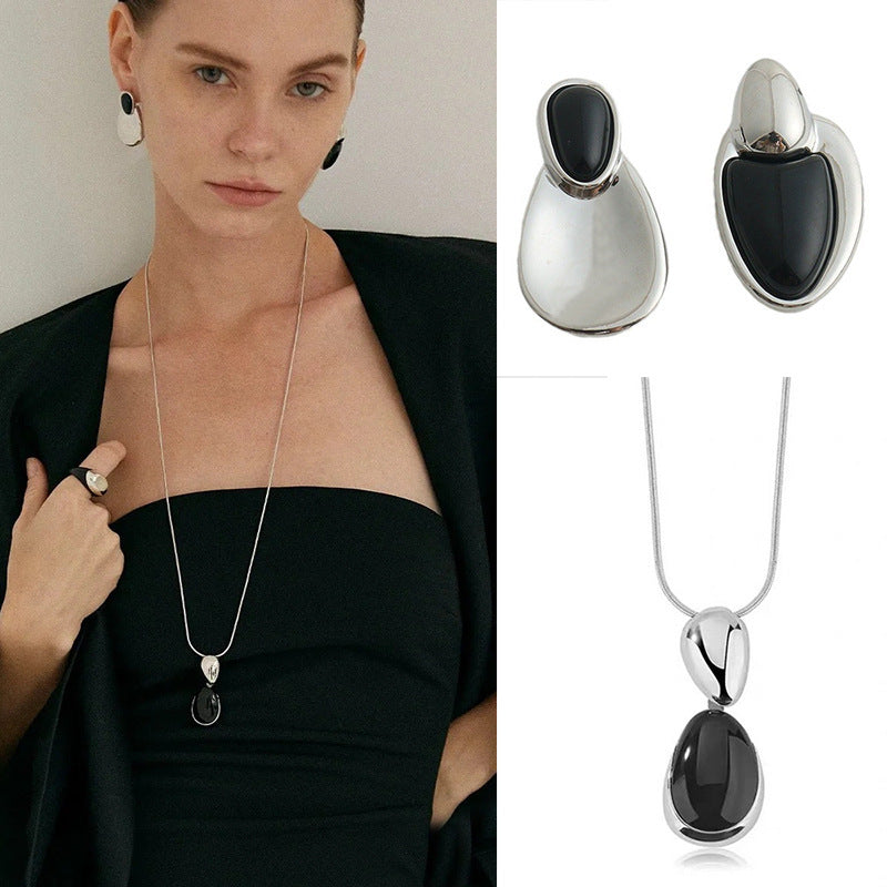 Black Onyx Necklace or Earrings in Gold or Silver Tone, Irregular Stitched Design — detail close-up