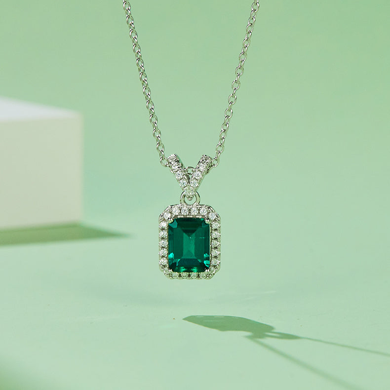 Sterling Silver Lab-Grown Emerald Pendant Necklace, Emerald Cut with Halo — detail close-up