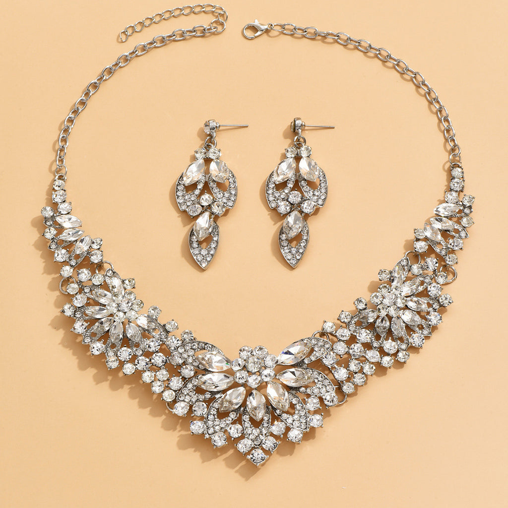 Stone-Set Flower Necklace and Earrings Bridal Set in Green, Red — front view