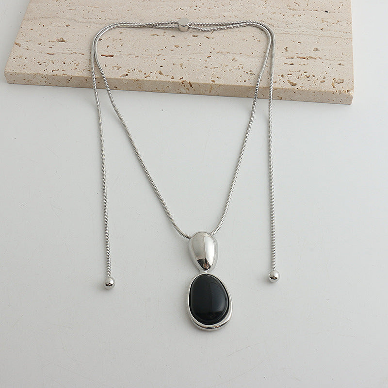 Black Onyx Necklace or Earrings in Gold or Silver Tone, Irregular Stitched Design — finish detail