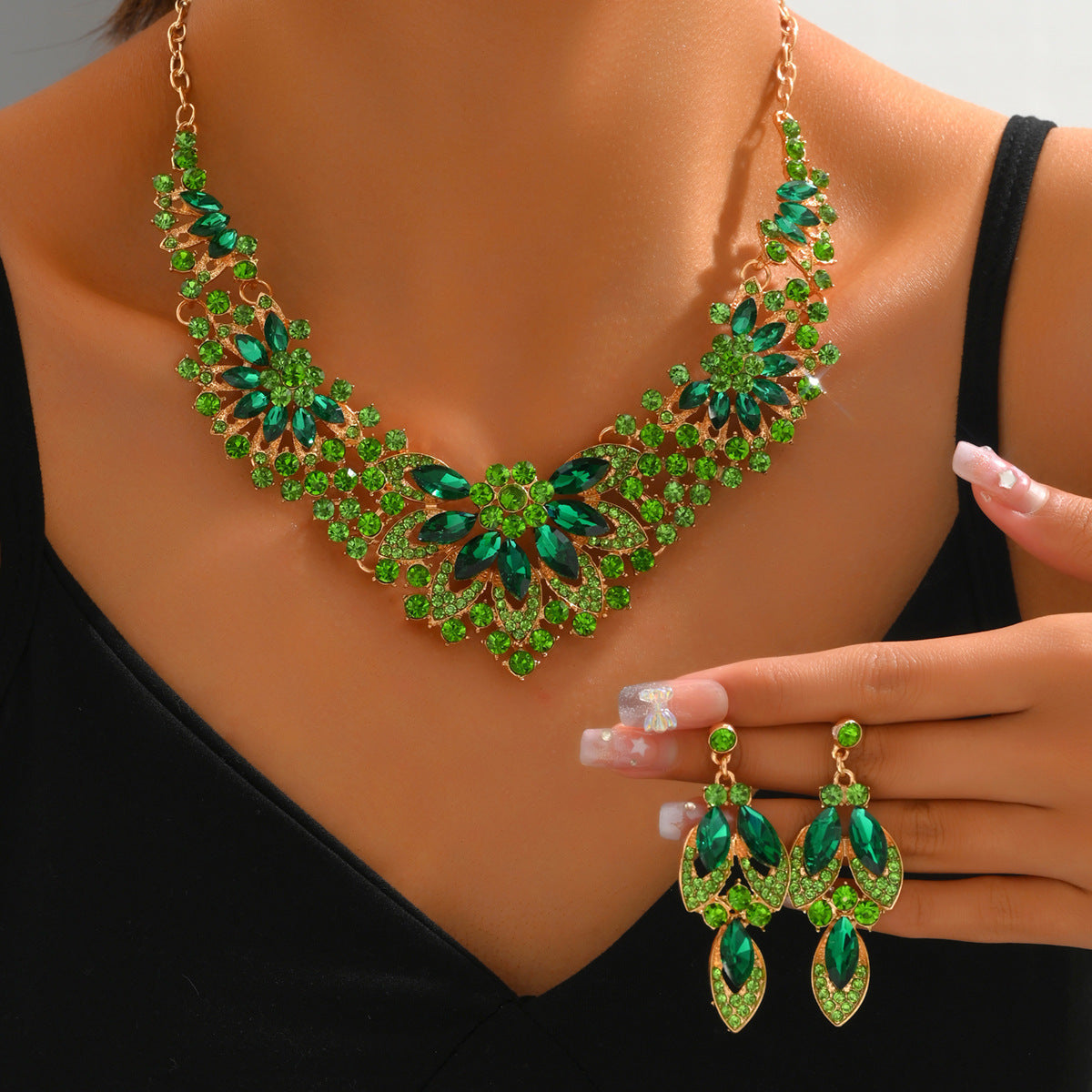 Stone-Set Flower Necklace and Earrings Bridal Set in Green, Red — detail close-up