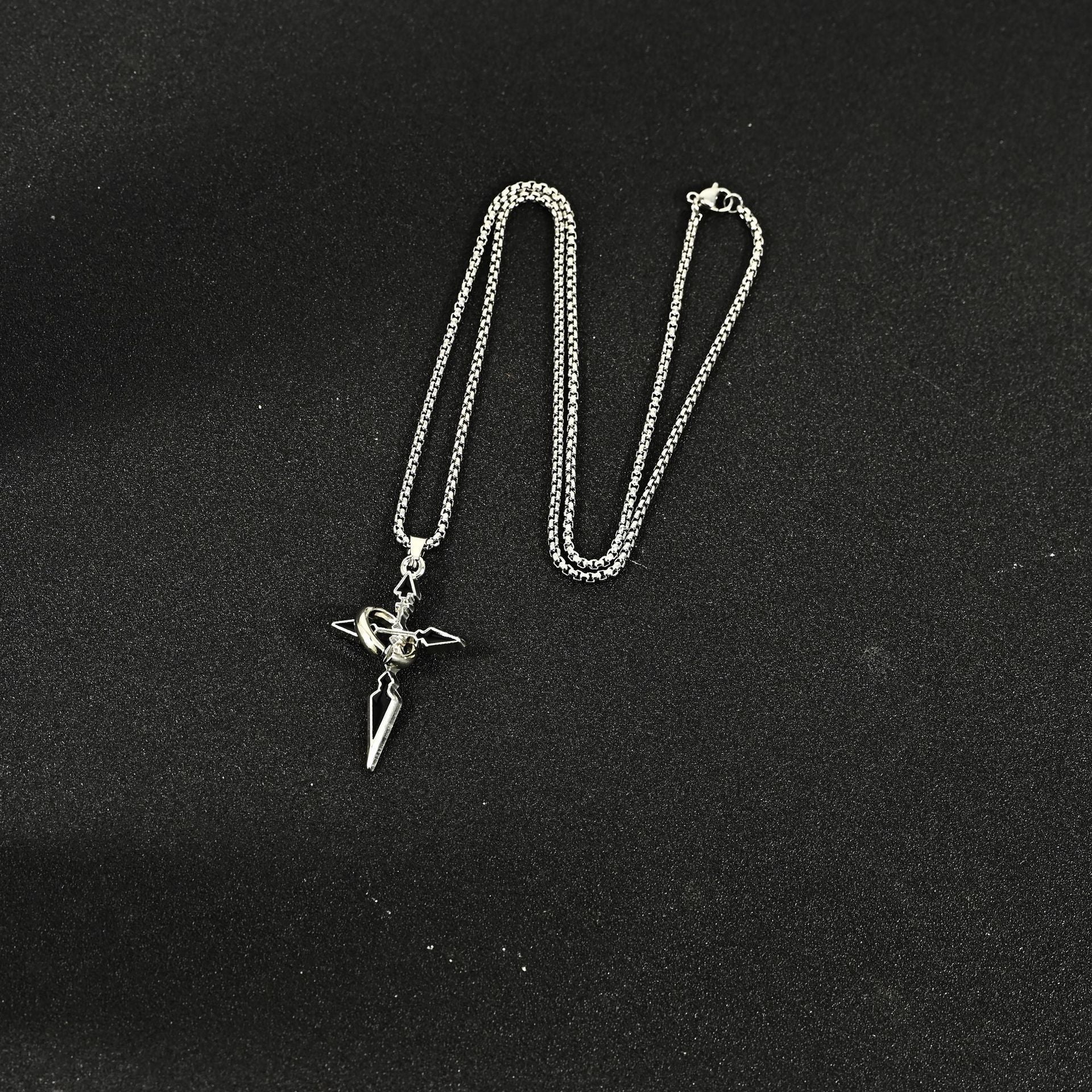 Titanium Steel Cross Necklace for Men, Pendant with Ring Detail — detail close-up