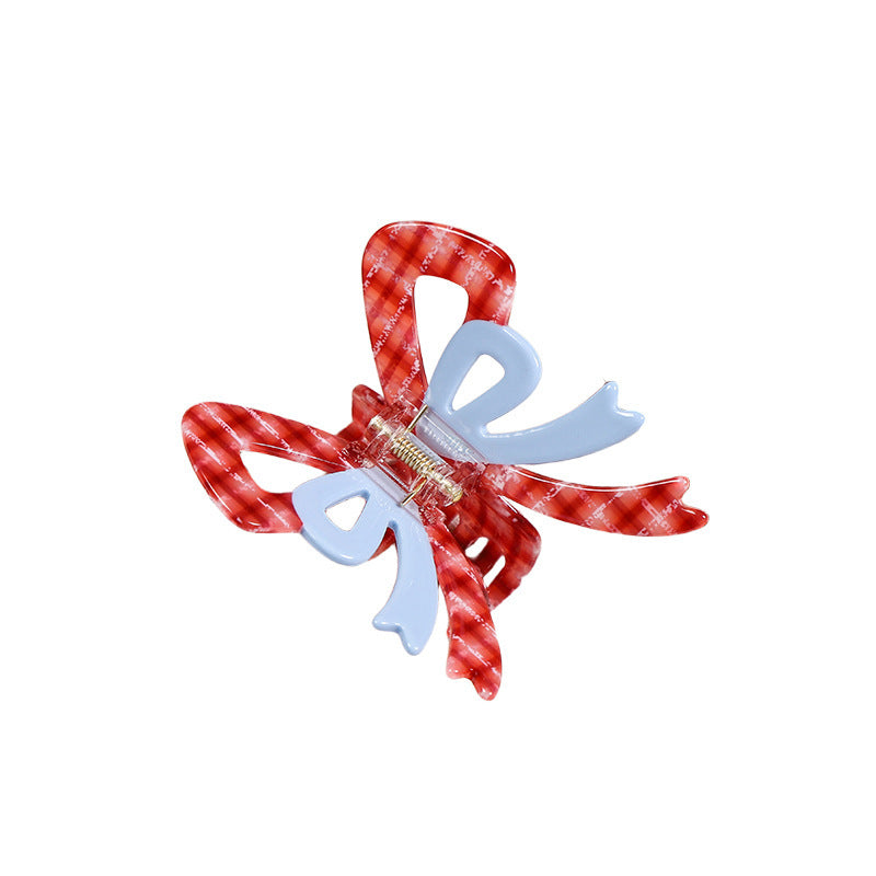 Cellulose Acetate Butterfly Hair Claw Clip in Four Designs — shown in use