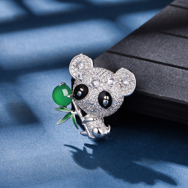 Sterling Silver Panda Brooch With 8 x 6 mm Oval Green Chalcedony and Pave Stones — side view