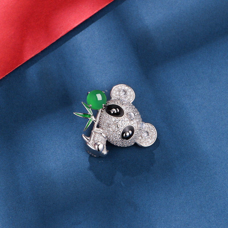 Sterling Silver Panda Brooch With 8 x 6 mm Oval Green Chalcedony and Pave Stones — shown in use