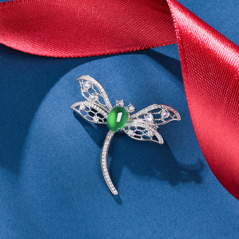 Sterling Silver Dragonfly Brooch With 8 x 6 mm Green Chrysoprase Cabochon, Platinum-Plated — shown in use